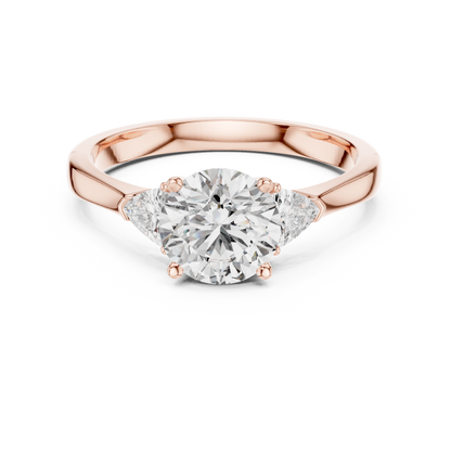 Round Brilliant Three-Stone Diamond Ring with Trillion Side Stones