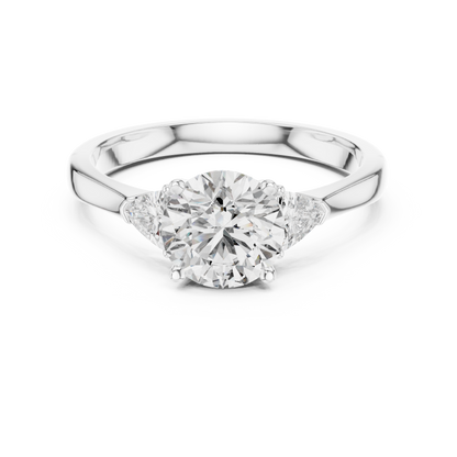 Round Brilliant Three-Stone Diamond Ring with Trillion Side Stones