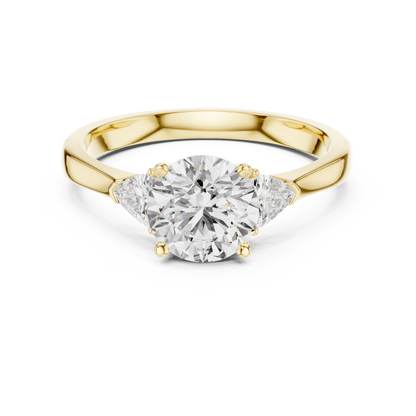 Round Brilliant Three-Stone Diamond Ring with Trillion Side Stones