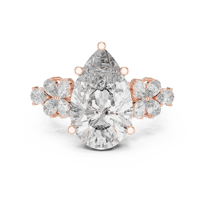Pear-Shaped Green Gemstone Ring with Diamond Side Accents