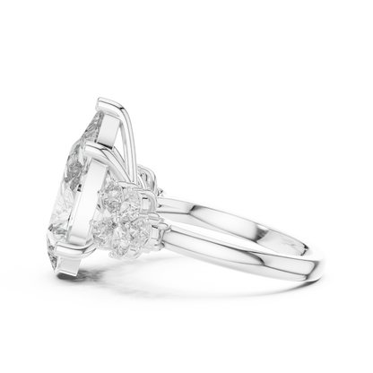 Pear-Shaped Green Gemstone Ring with Diamond Side Accents