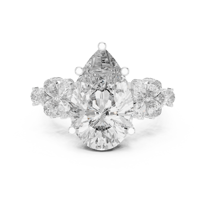 Pear-Shaped Green Gemstone Ring with Diamond Side Accents