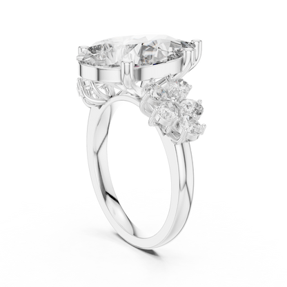 Pear-Shaped Green Gemstone Ring with Diamond Side Accents