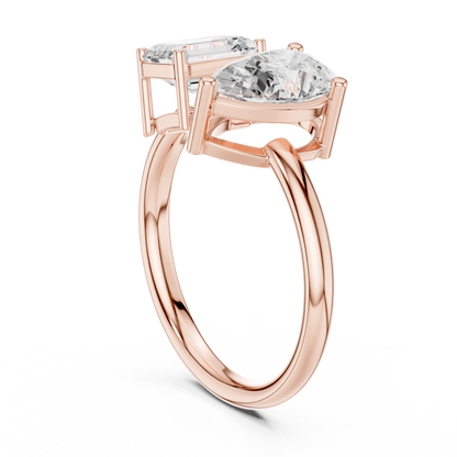 Emerald-Cut and Pear-Shaped Diamond Ring