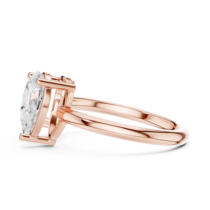 Emerald-Cut and Pear-Shaped Diamond Ring