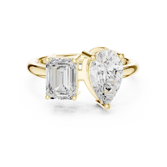 Emerald-Cut and Pear-Shaped Diamond Ring