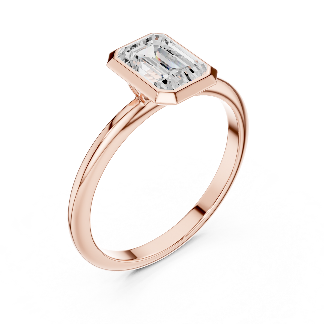 Sleek Emerald Diamond Engagement Ring