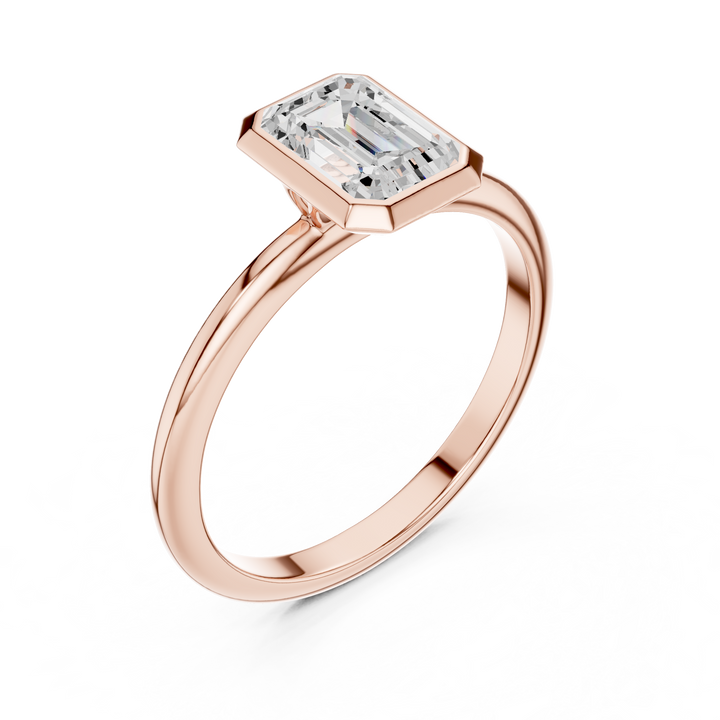 Sleek Emerald Diamond Engagement Ring