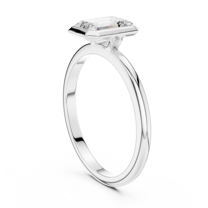 Sleek Emerald Diamond Engagement Ring