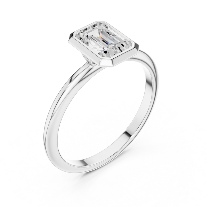 Sleek Emerald Diamond Engagement Ring