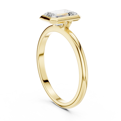 Sleek Emerald Diamond Engagement Ring
