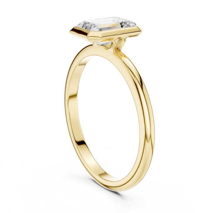 Sleek Emerald Diamond Engagement Ring