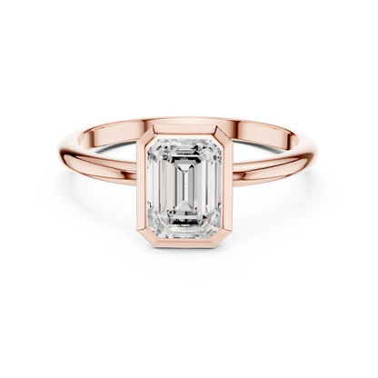 Sleek Emerald Diamond Engagement Ring