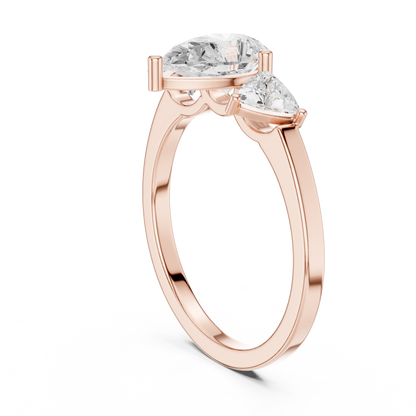 Pear Cut Three-Stone Diamond Ring with Curved Trillion Side Stones