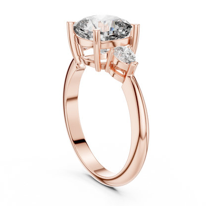 Cushion Cut Three-Stone Diamond Ring with Pear Side Stones
