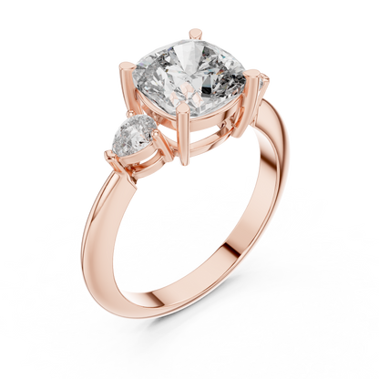 Cushion Cut Three-Stone Diamond Ring with Pear Side Stones